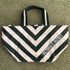 Victoria Secret large pink and black tote with zipper and interior pockets.